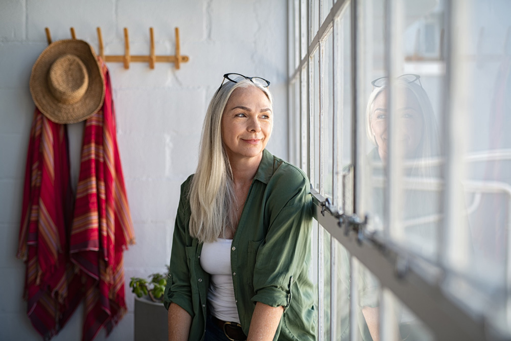 Woman looking out the window