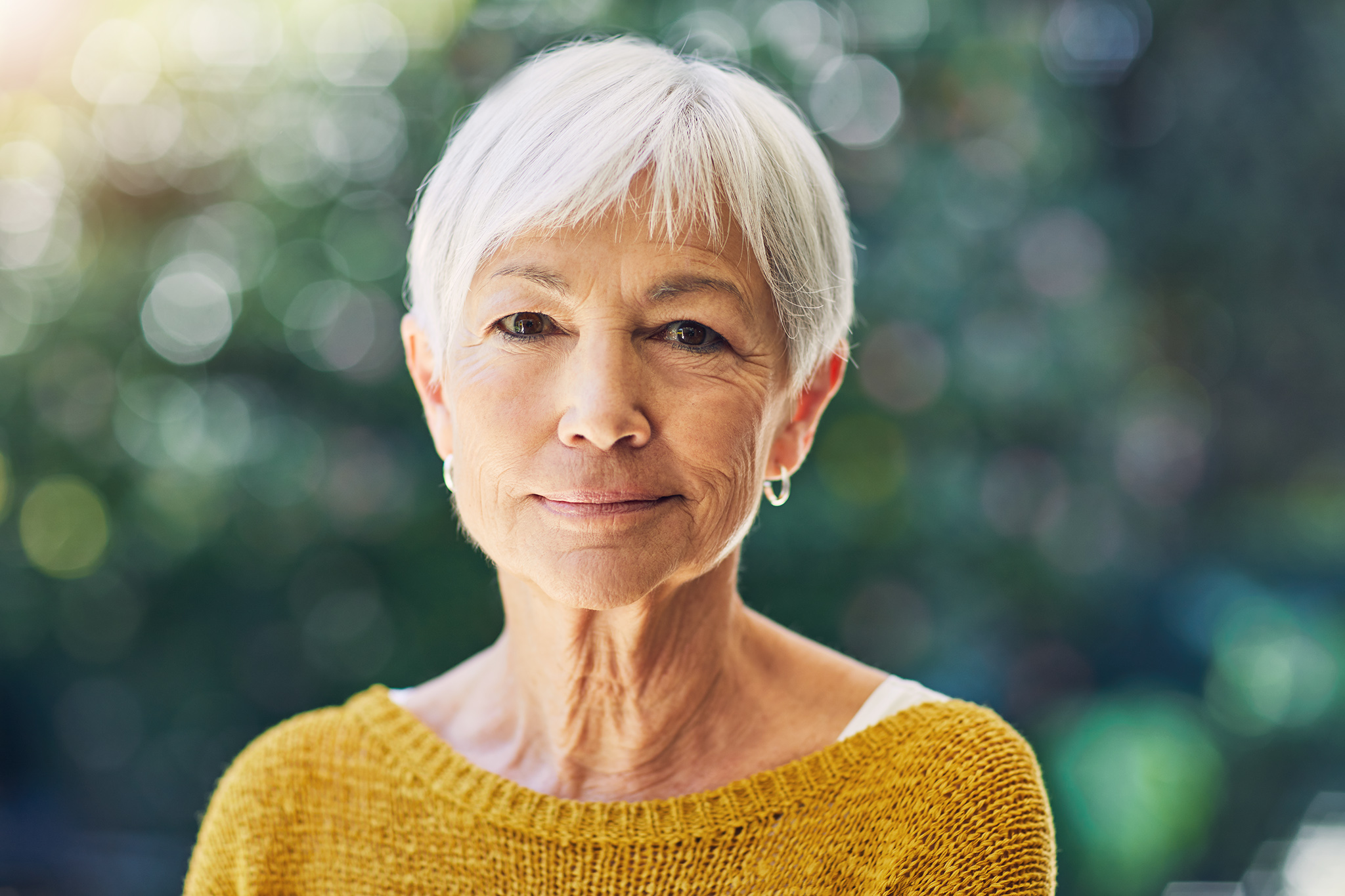 Shot of a confident senior woman standing outdoors