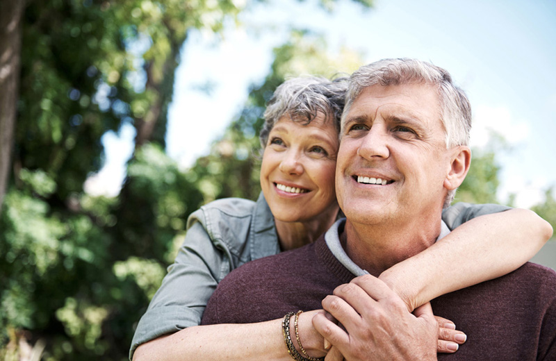 Shot of a mature couple spending time together in their backyard